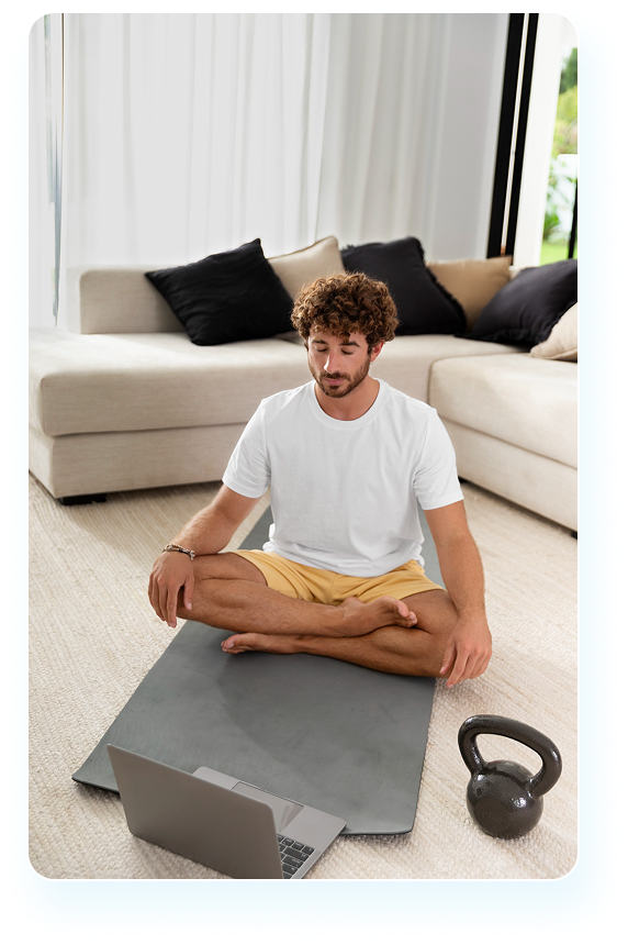 Man exercising with kettlebell at home